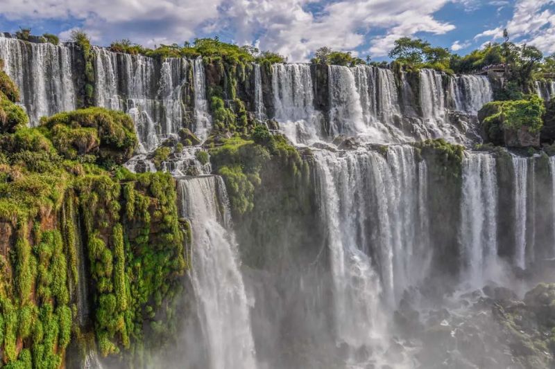Iguazu Falls is a majestic natural wonder made up of more than 275 cascades and is the largest waterfall system in the world