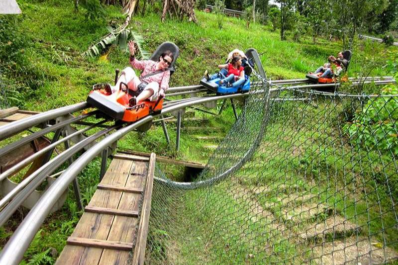Have a heart-stopping experience when experiencing the mountain slide game at Datanla waterfall